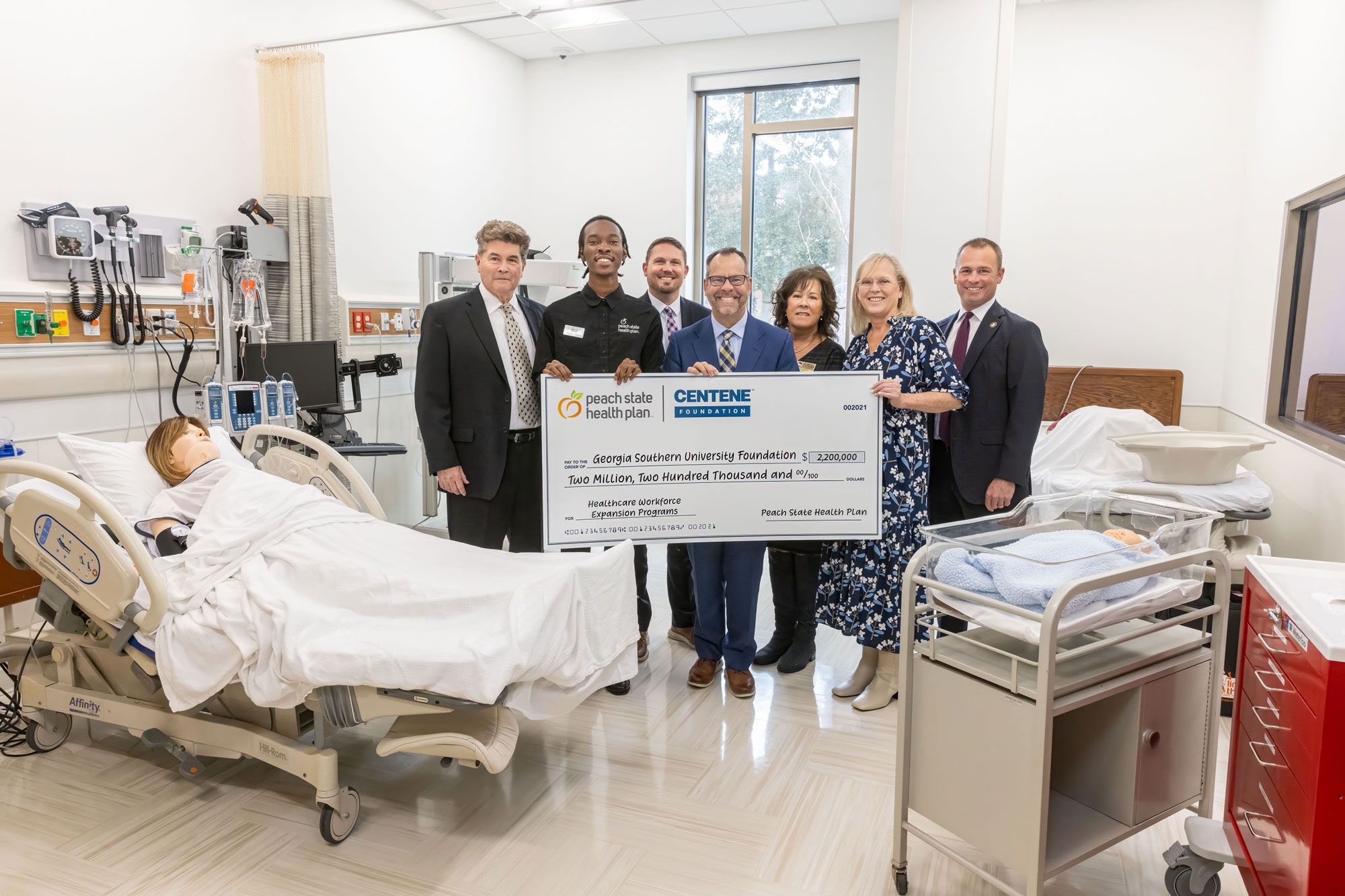 Centene Leaders with Georgia Southern Leaders and large check