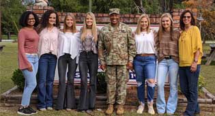 Former pen pals reunited after more than 10 years. Pictured are (L to R): Hannah Jackson, Boslie Booth, Maci Nease, Jenna Mosley, Gen. Buggs, Tatum Taylor, Skyler Sikes, Former DEA Kindergarten Teacher Michelle Lamm.